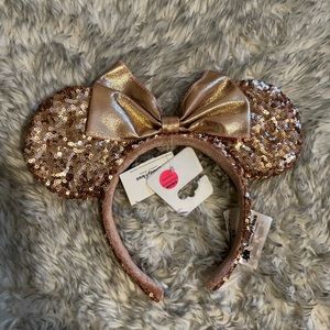 Disney ears Rose gold Minnie ears with a bow ( park exclusive )